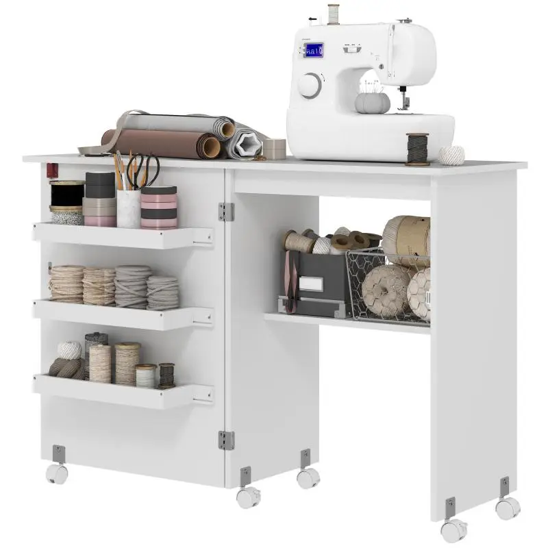 Folding sewing table with drop-leaf, storage bins, open shelf, and casters – White