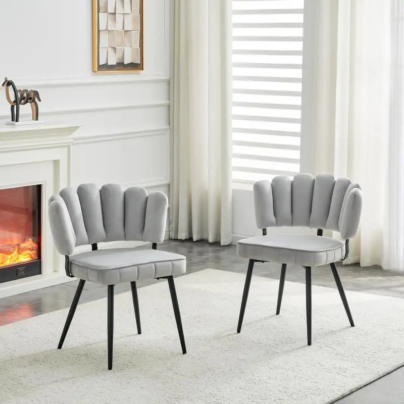 Set of 2 European-style dining chairs with floral-design backrests and velvet upholstery. Soft light-grey velvet and black metal legs, 80 cm high; suitable for living and dining areas.